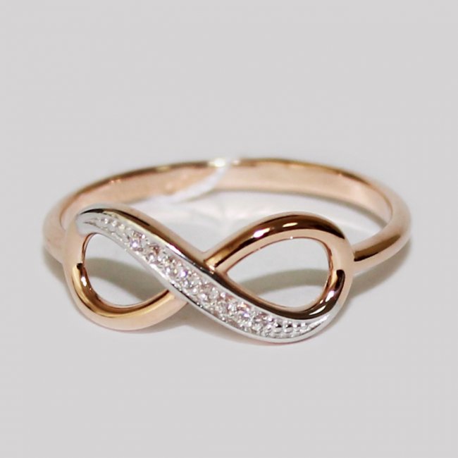 Золотое кольцо с бриллиантами знак бесконечность