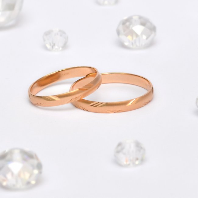 Обручальные кольца с алмазной гранью