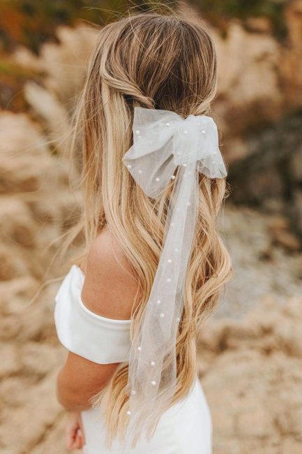 Банты для волос – трендовые аксессуары для прически невесты