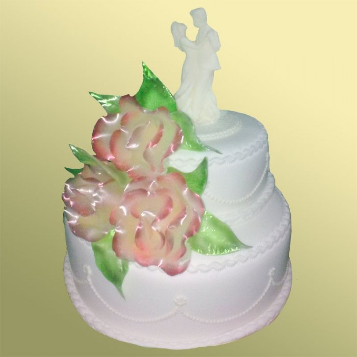 Свадебный торт 19 Двухъярусный торт декорирован мастикой, карамелью, шоколадом.