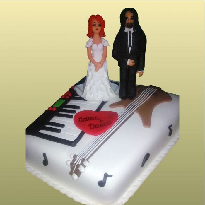 Свадебный торт 24 Торт декорирован мастикой и марципаном.