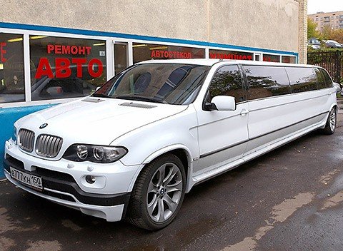 Заказ лимузинов, автомобили на свадьбу. Лимузин BMW X5, белый. Шикарный салон